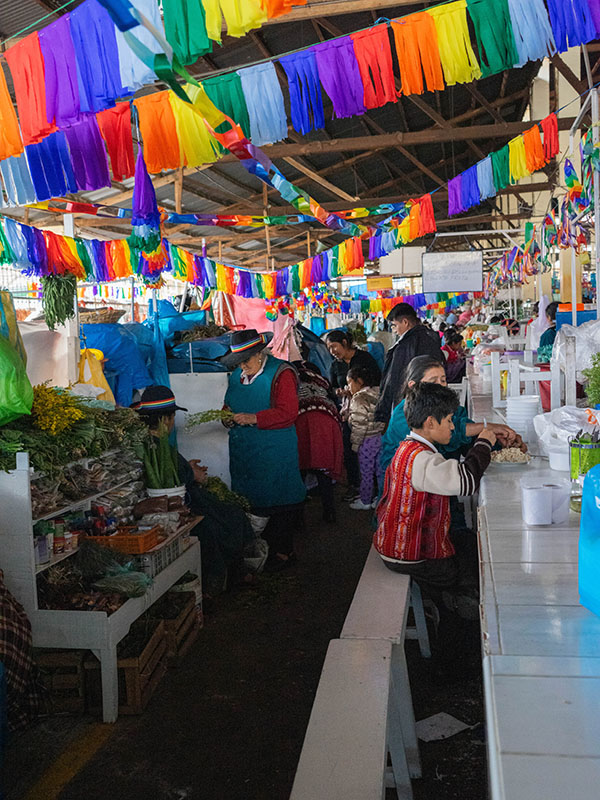 People eating at the San Pedro Market in Cusco Peru