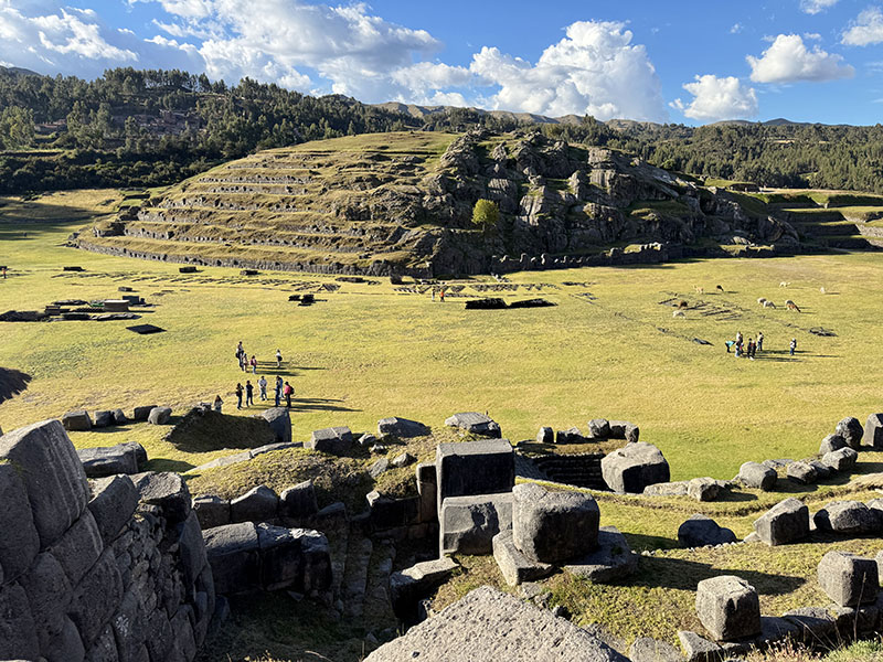 The Saqsaywaman Ruins in Cusco Peru - large stones and an open field below