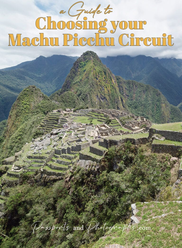 Machu Picchu with lush green mountains and ancient ruins in Peru.